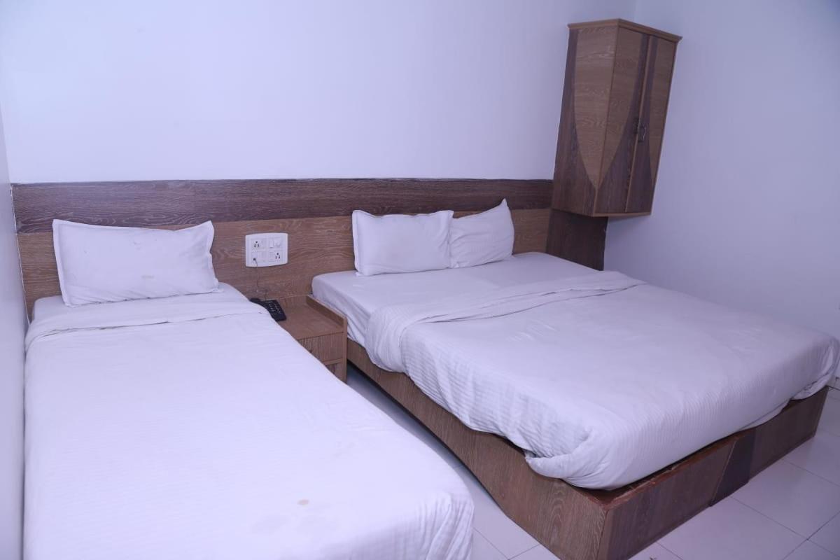 Hotel Kewal Inn Jalgaon Экстерьер фото